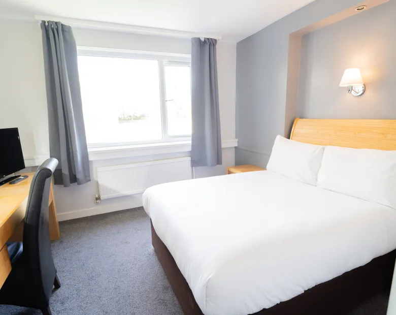 Double bedroom with desk and en-suite at Sporting Lodge Inns Middlesbrough