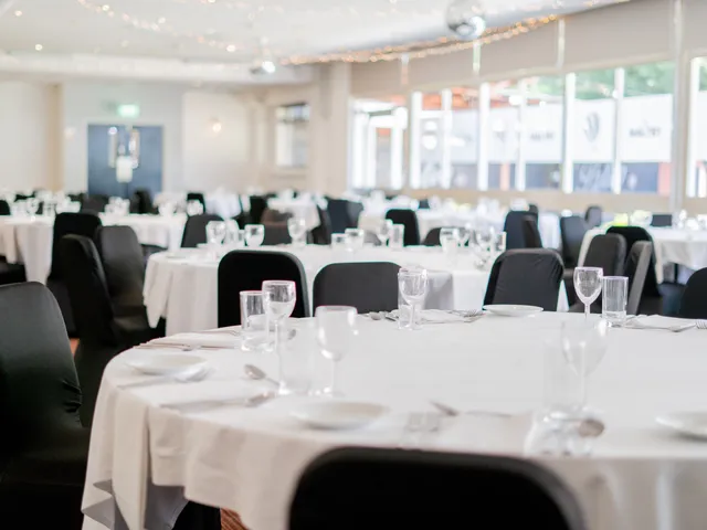 Banqueting tables set for a gala dinner at Sporting Lodge Inns