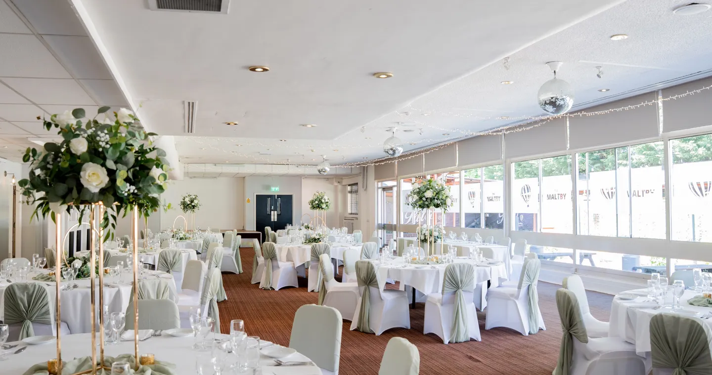 Wedding reception tables prepared in the Maltby Suite at Sporting Lodge Inns
